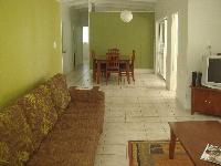 Set on an acre of tropical gardens right on the beach is the large four bedroom 2 bathroom beach house, Anchors Rest.