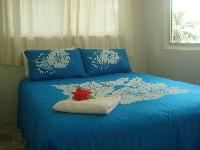 Set on an acre of tropical gardens right on the beach is the large four bedroom 2 bathroom beach house, Anchors Rest.