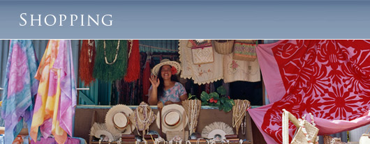 Mama at the Rarotonga Local Market selling crafts and pareu